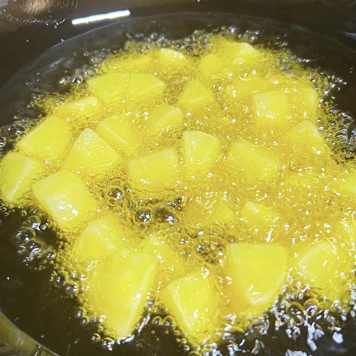 Deep frying pork golden brown